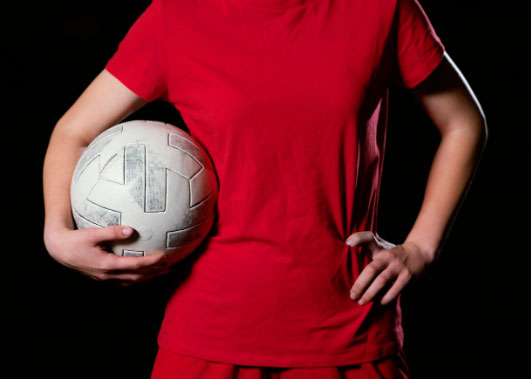 Ball under arm