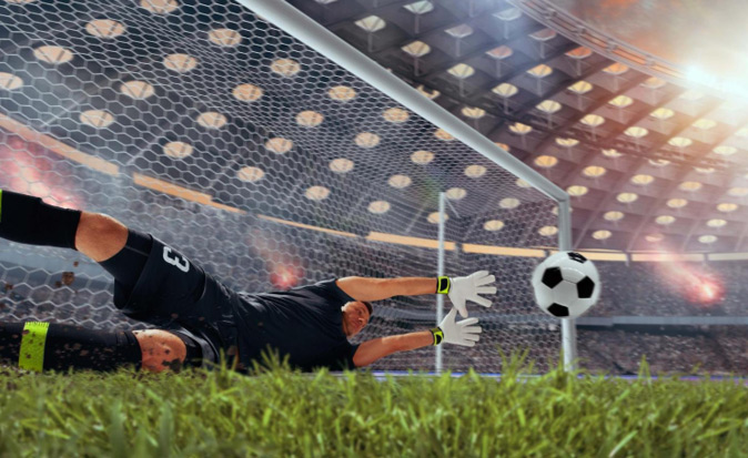 Goalkeeper in football makes a save
